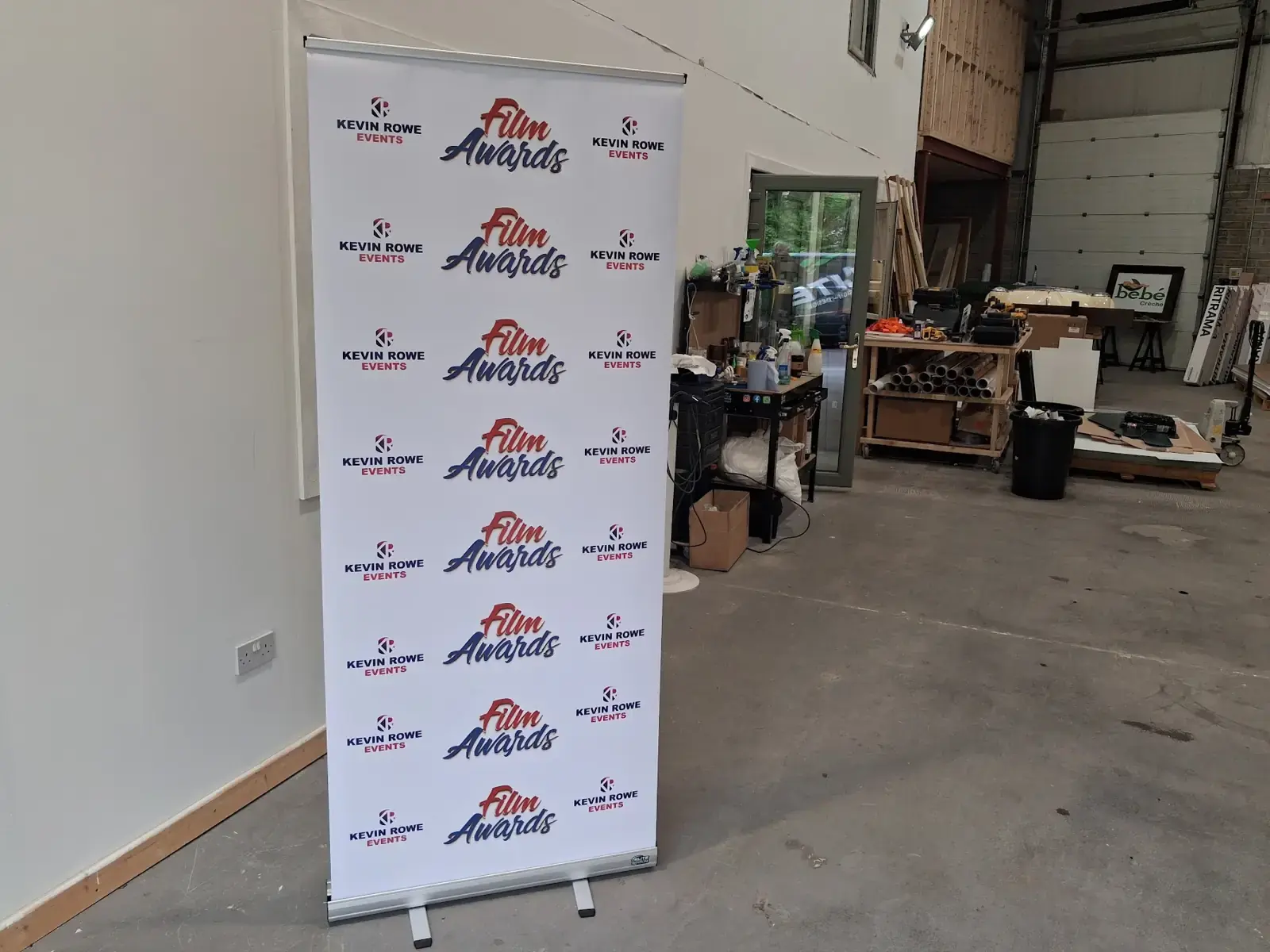 Roll-up banners and exhibition displays in the workshop